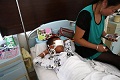 Bola mata bocah China 6 tahun dicungkil pedagang organ