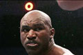 Tyson kembalikan potongan telinga Holyfield