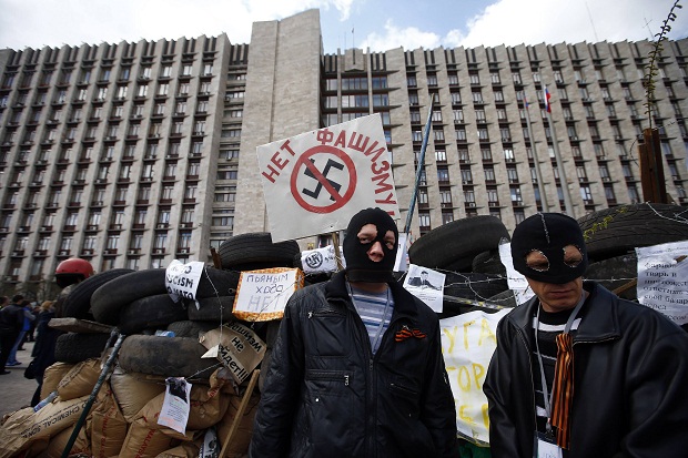 Tinggalkan pos polisi, separatis pro Rusia duduki gedung lain