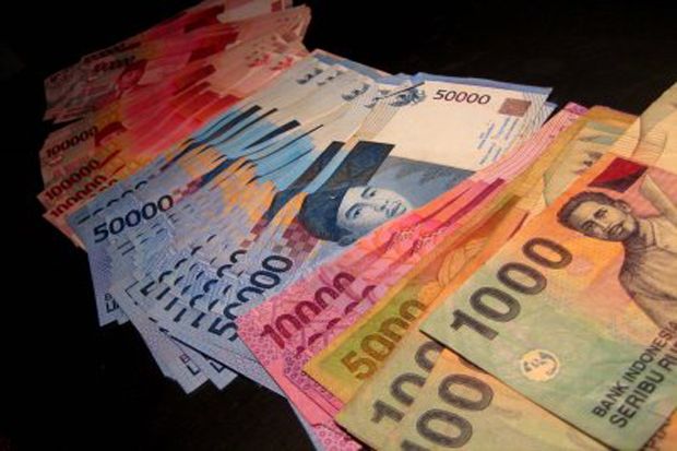 Rupiah Berakhir Stagnan di Level Rp11.971/USD