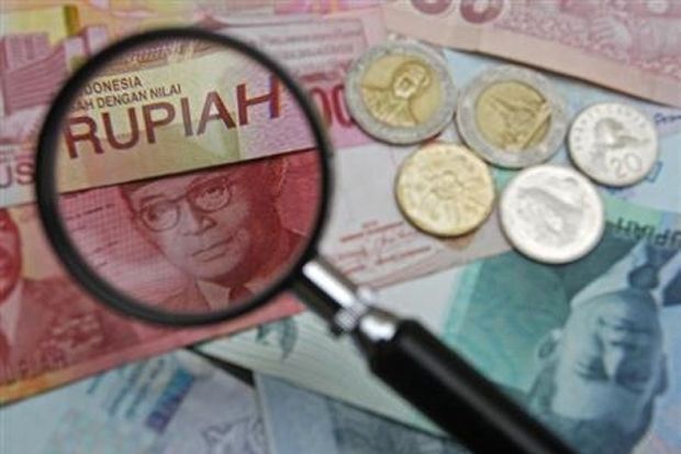 Ikuti Jejak IHSG, Rupiah Melempem ke Rp13.065/USD