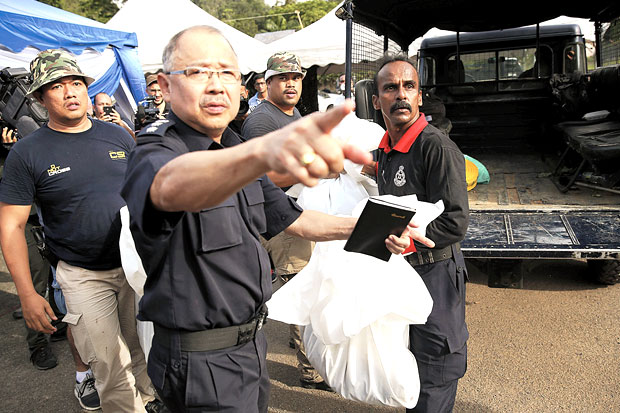 Polisi Malaysia Gali 139 Kuburan