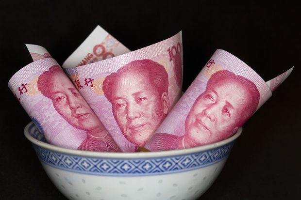 Yuan Perpanjang Penurunan karena Serangan Paris