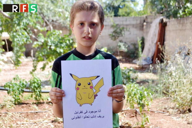 Minta Diselamatkan, Bocah Suriah Berfoto Sambil Pegang Gambar Pokemon