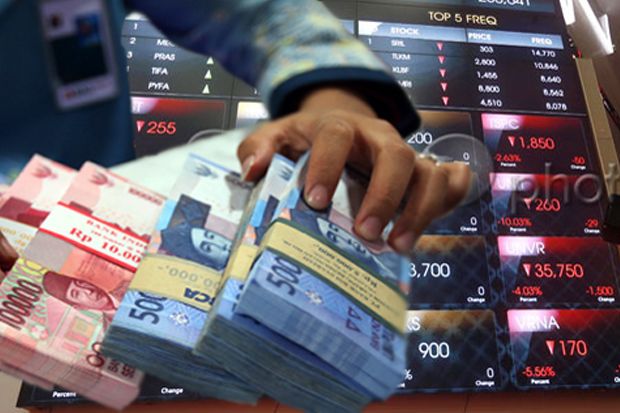 Rupiah Mixed, IHSG Siang Ini Masih Betah di Area Negatif