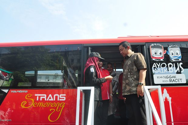 Telkomsel Luncurkan T-Cash di Bus Trans Semarang