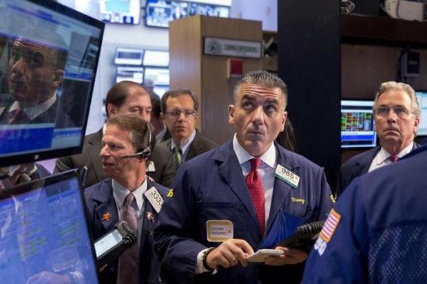 Wall Street Ditutup Melemah Terbebani Harga Minyak dan Saham GE