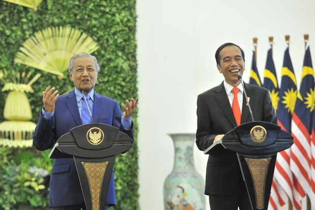 Jokowi Minta Mahathir Lindungi TKI di Malaysia