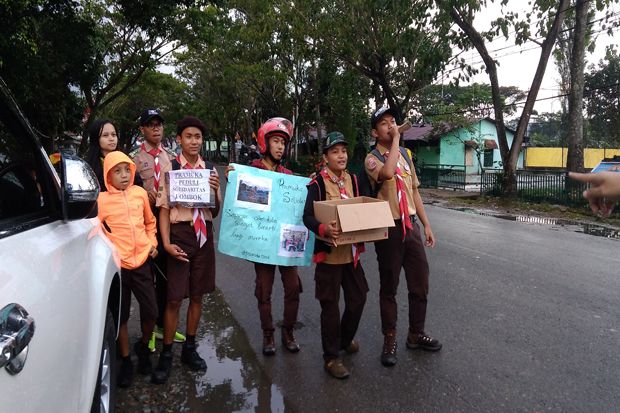 Puluhan Anak Pramuka Toraja Utara Gelar Aksi Peduli Lombok