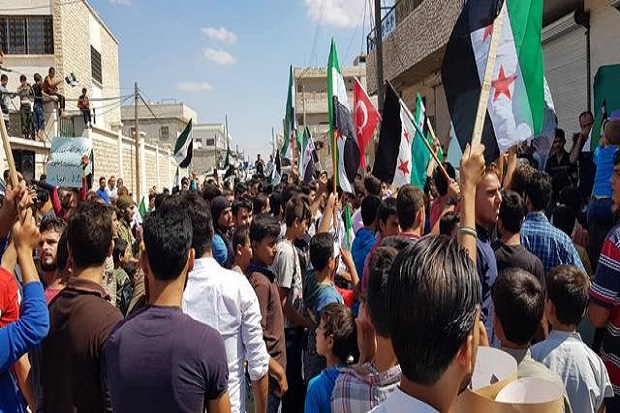 Demo Warga Idlib: Assad dan Rusia Teroris, Turki Saudara Kami