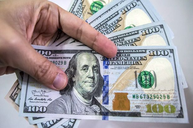 Dolar AS Turun Setelah The Fed Mempertahankan Suku Bunga