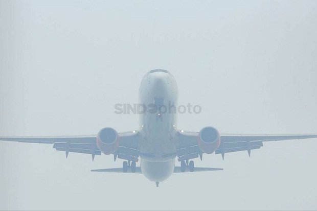 Terganggu Kabut Asap, Penerbangan di Palembang Delay 3 Jam Lebih