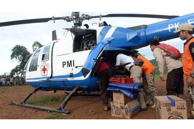 Pakai Hagglunds dan Helikopter, PMI Distribusikan Bantuan hingga Pelosok