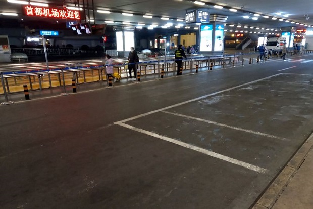 Dicengkeram Virus Corona, Wuhan dan Bandara Beijing bak Kota Hantu