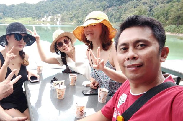 Tak Terpengaruh Wabah Corona, Turis China di Sulut Tetap Terlihat Nyaman