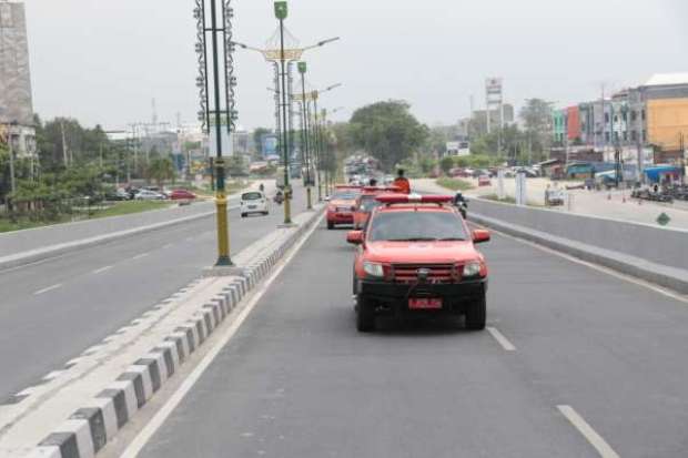 Tim Konvoi Kendaraan Ajak Masyarakat Kota Pekanbaru Jaga Kesehatan