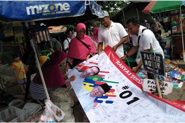 Relawan Jokowi Maruf Aksi Serentak di Sejumlah Pasar di Jabodetabek