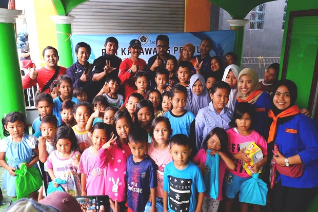 PWI-bank bjb Karawang Berikan Trauma Healing Anak-anak Korban Banjir