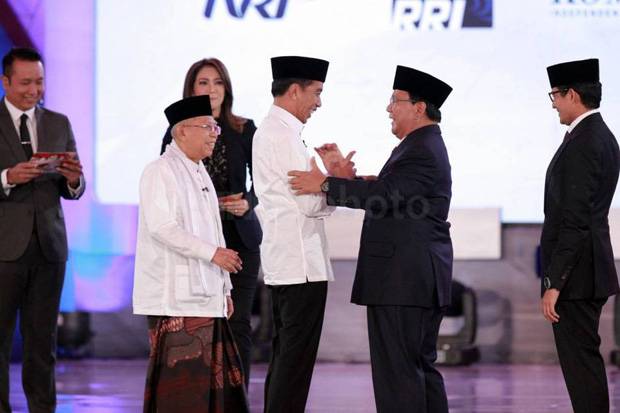 Jokowi Lugas, Ma’ruf Tenang, Prabowo-Sandi Saling Berbagi