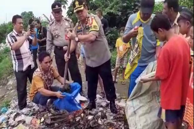 Kapolres Pelabuhan Belawan Gelar Bersih Sampah di Tanggul Sungai Deli