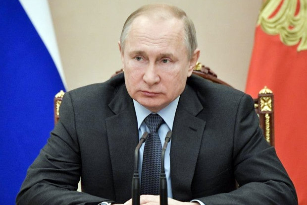 Putin Teken UU yang Melabeli Jurnalis sebagai Agen Asing