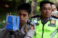 Polisi Lakukan Olah TKP di Lokasi Kecelakaan Mobil Setya Novanto