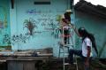 Puluhan Street Artist Cat Tembok Rumah Warga Bantul