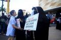 Puluhan Wanita Bercadar di Manado Lakukan Aksi Sosial Peluk Aku