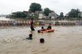 Jalan Jatinegara Barat Masih Terendam Banjir