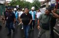 Menteri BUMN Kunjungi Korban Banjir di Cengkareng