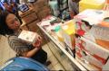 Antispasi Virus Corona, Warga Berburu Masker di Pasar Pramuka