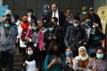 Gunakan Masker, Warga Jakarta Antisipasi Penyebaran Virus Corona