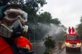 BPBD Kota Tangerang Semprotkan Disinfektan di Jalan Raya Daan Mogot